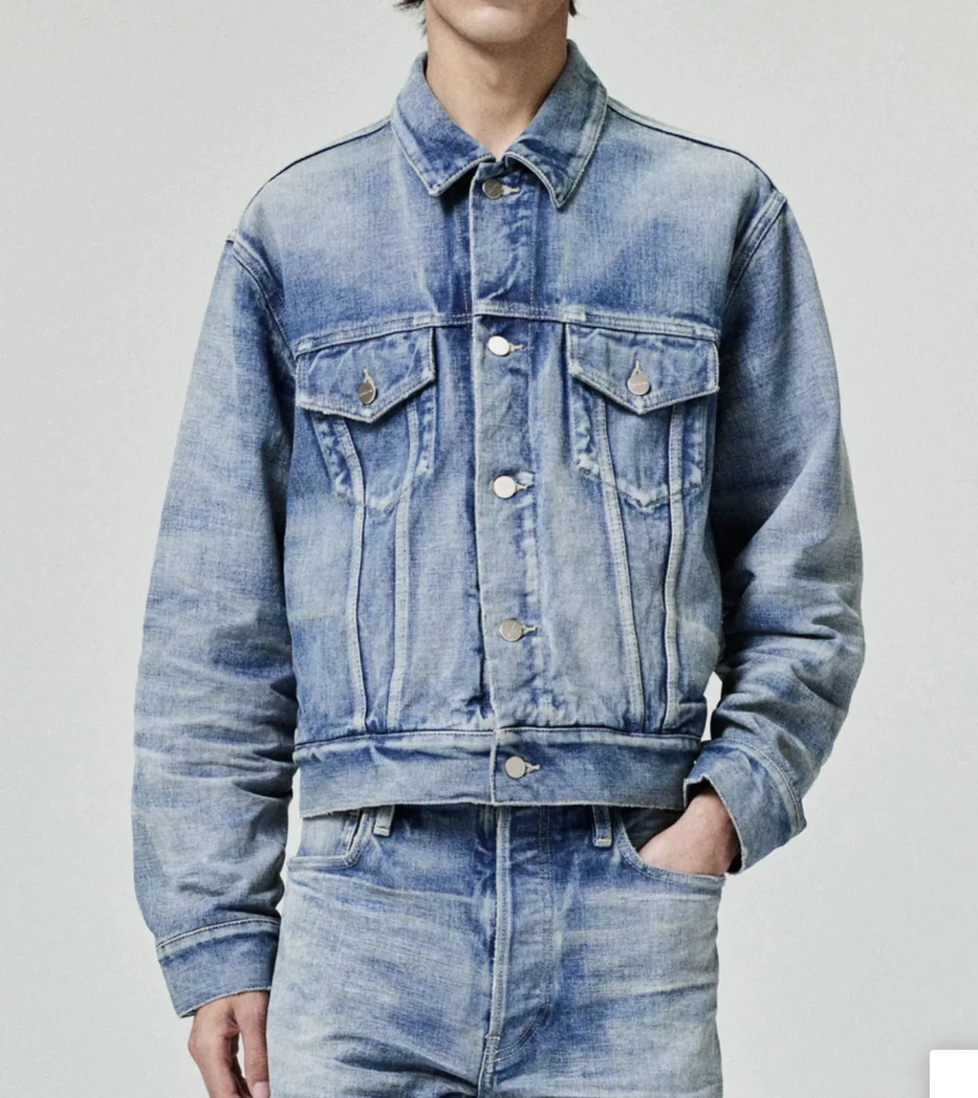 Product photo of a garment on a hanger